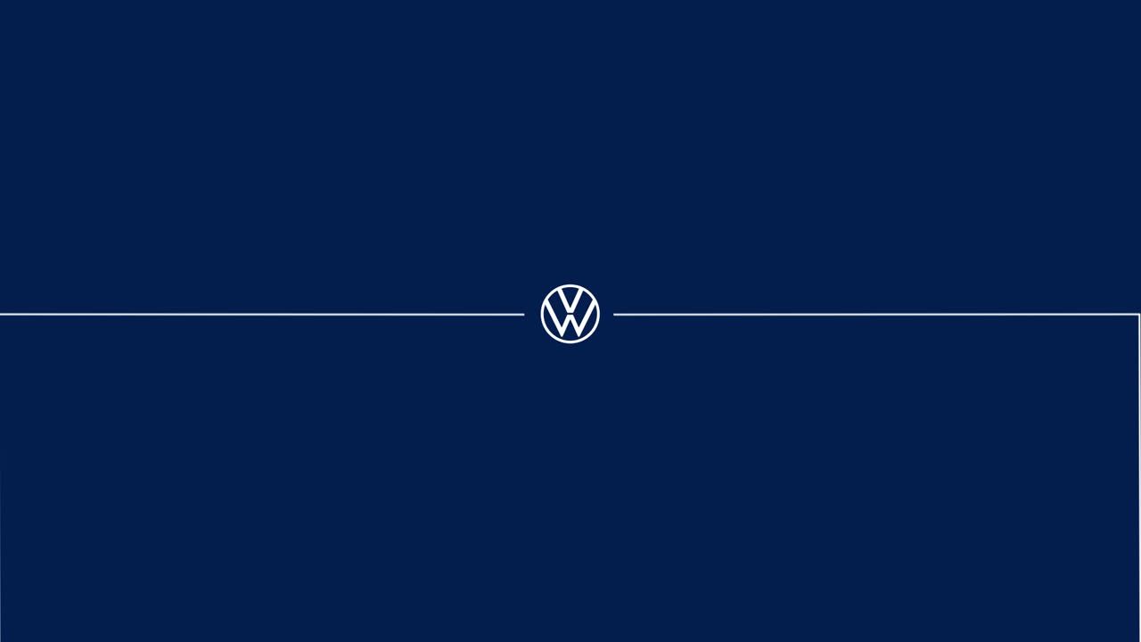 Das Bild zeigt das Volkswagen-Logo in der Mitte eines dunkelblauen Hintergrunds. Das Logo ist von einer horizontalen Linie umgeben.